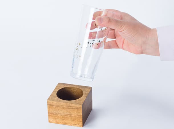 Soka Gakkai glass flower stand teak base